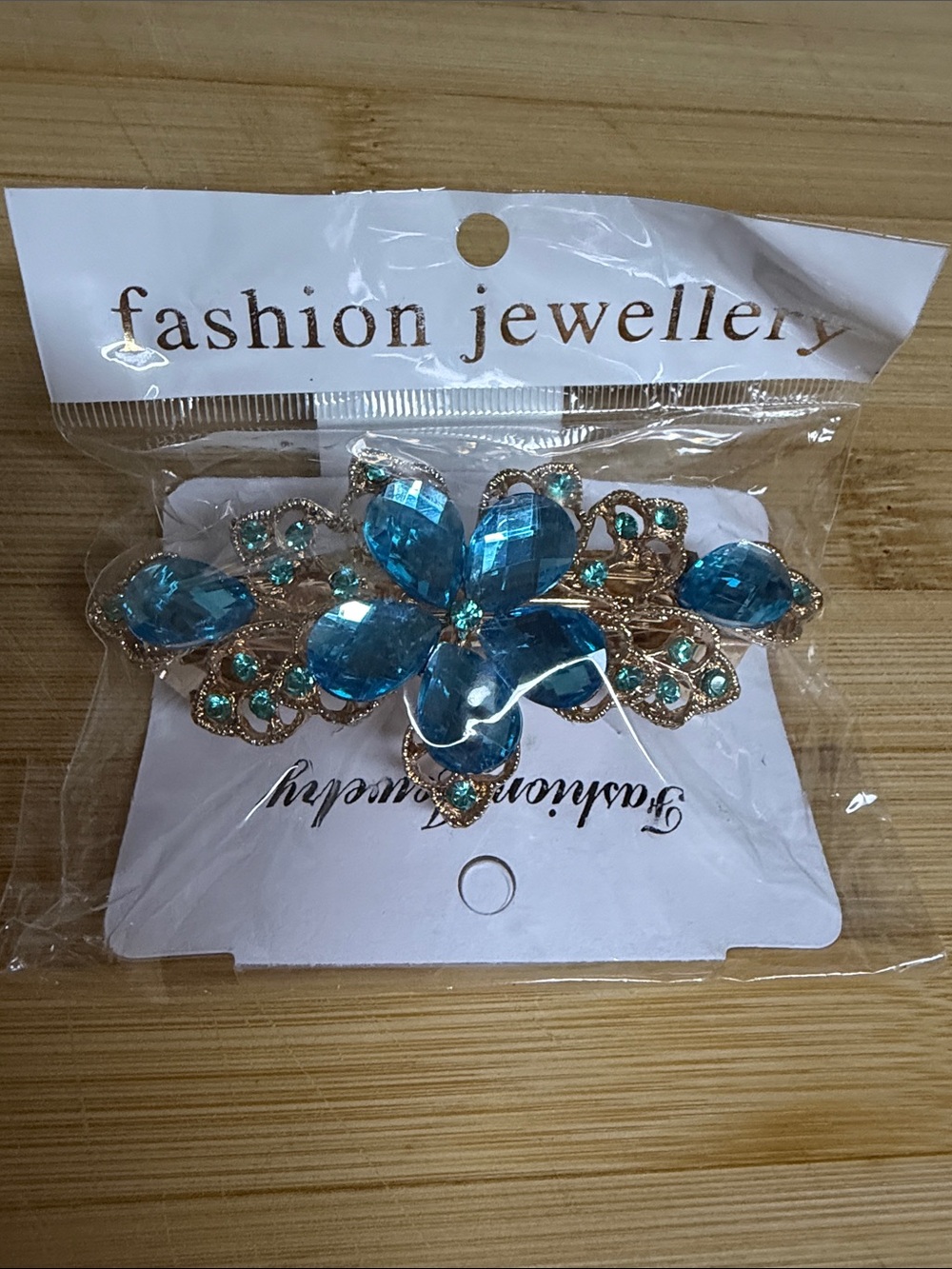 Fashion Jewelry Blue Crystal Floral Brooch with Gold Accents